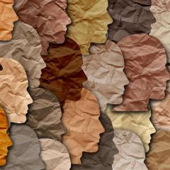 Paper cut outs showing diverse human silhouettes